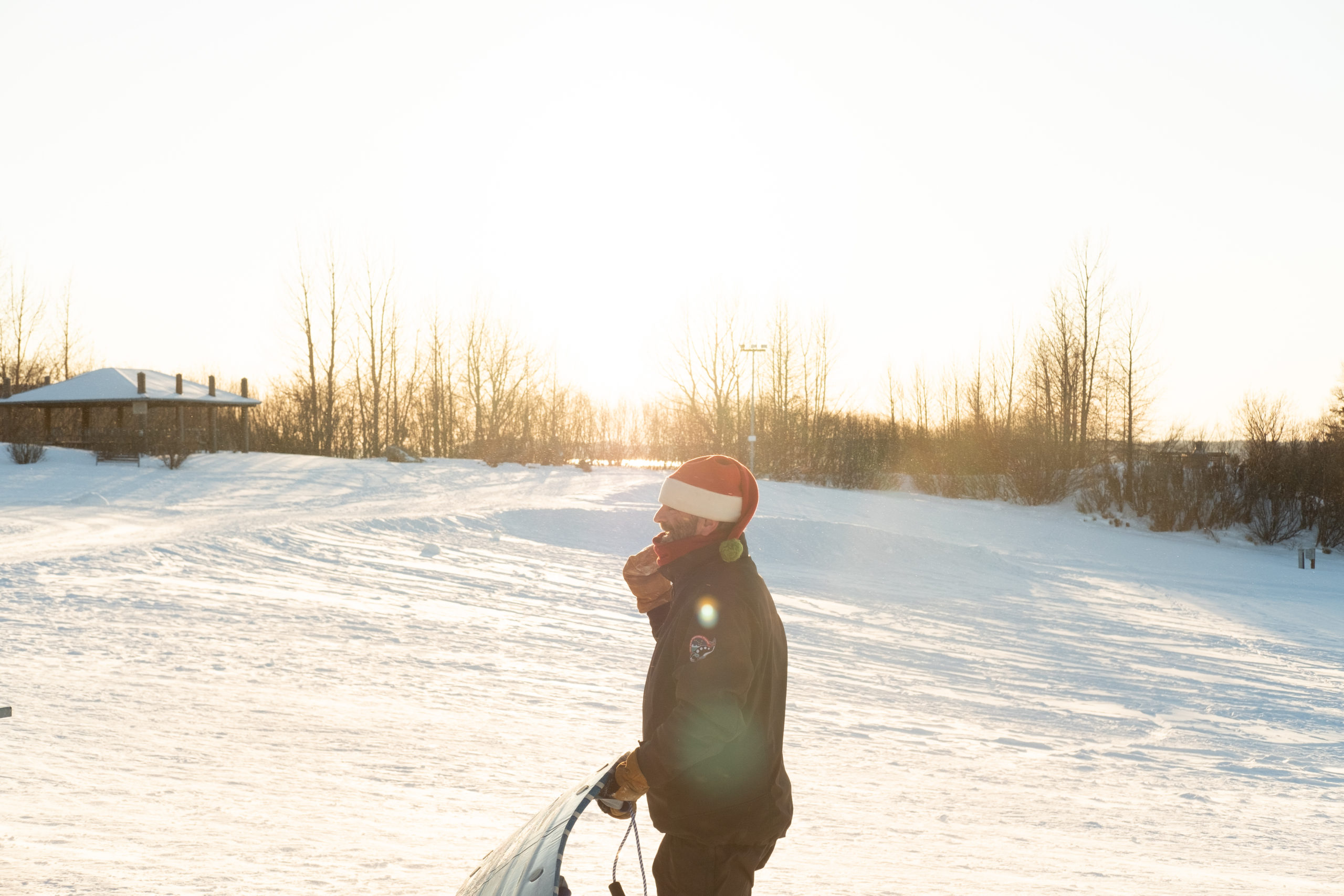 Tom Homza decked in Santa gear at ROP sledding event